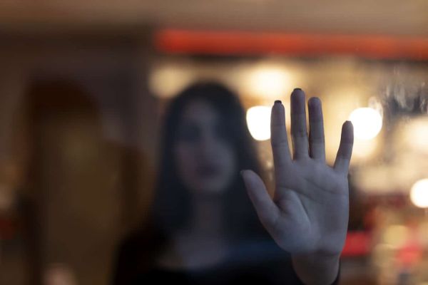 Woman making stop gesture with her hand